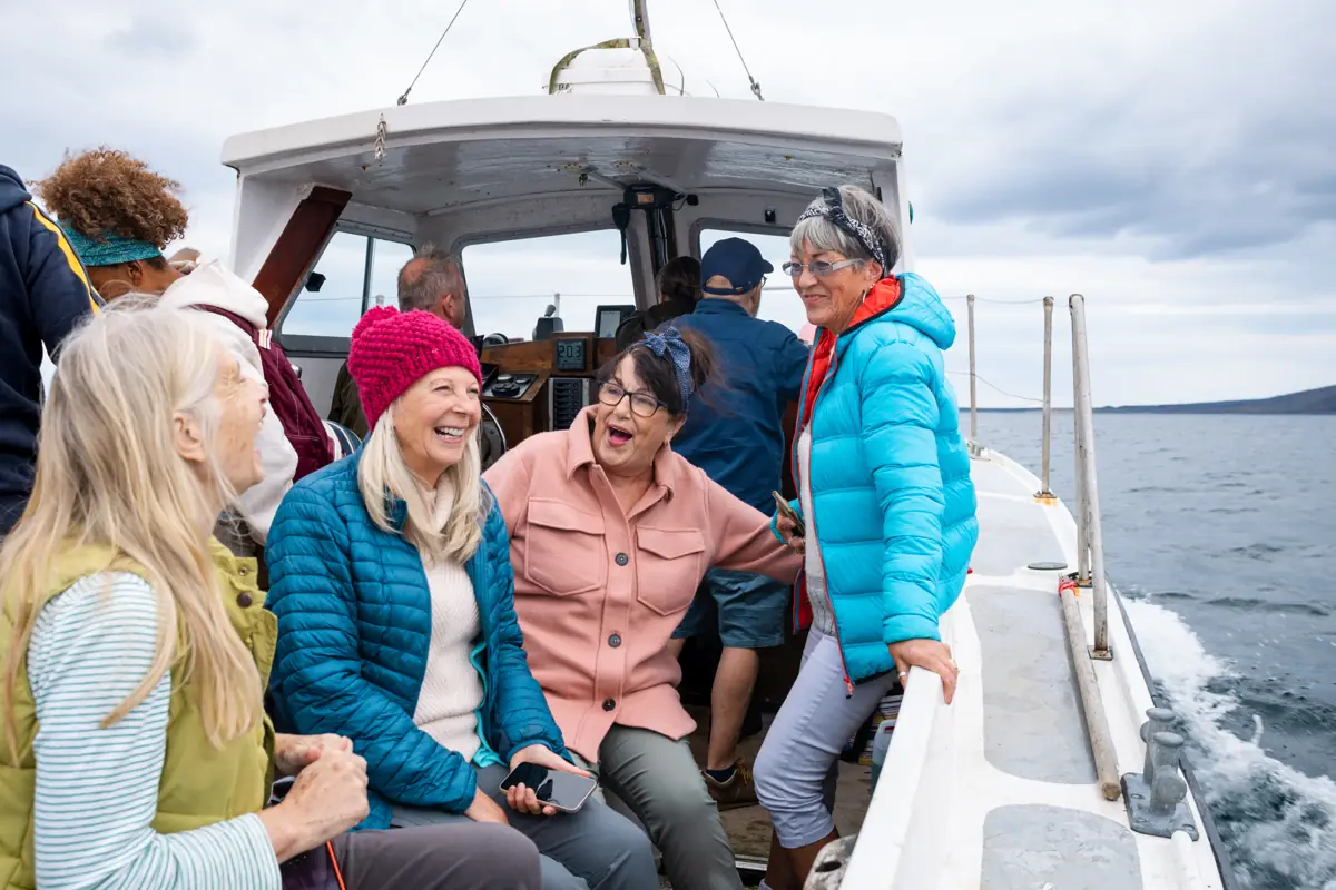Group of travellers on a boat excursion