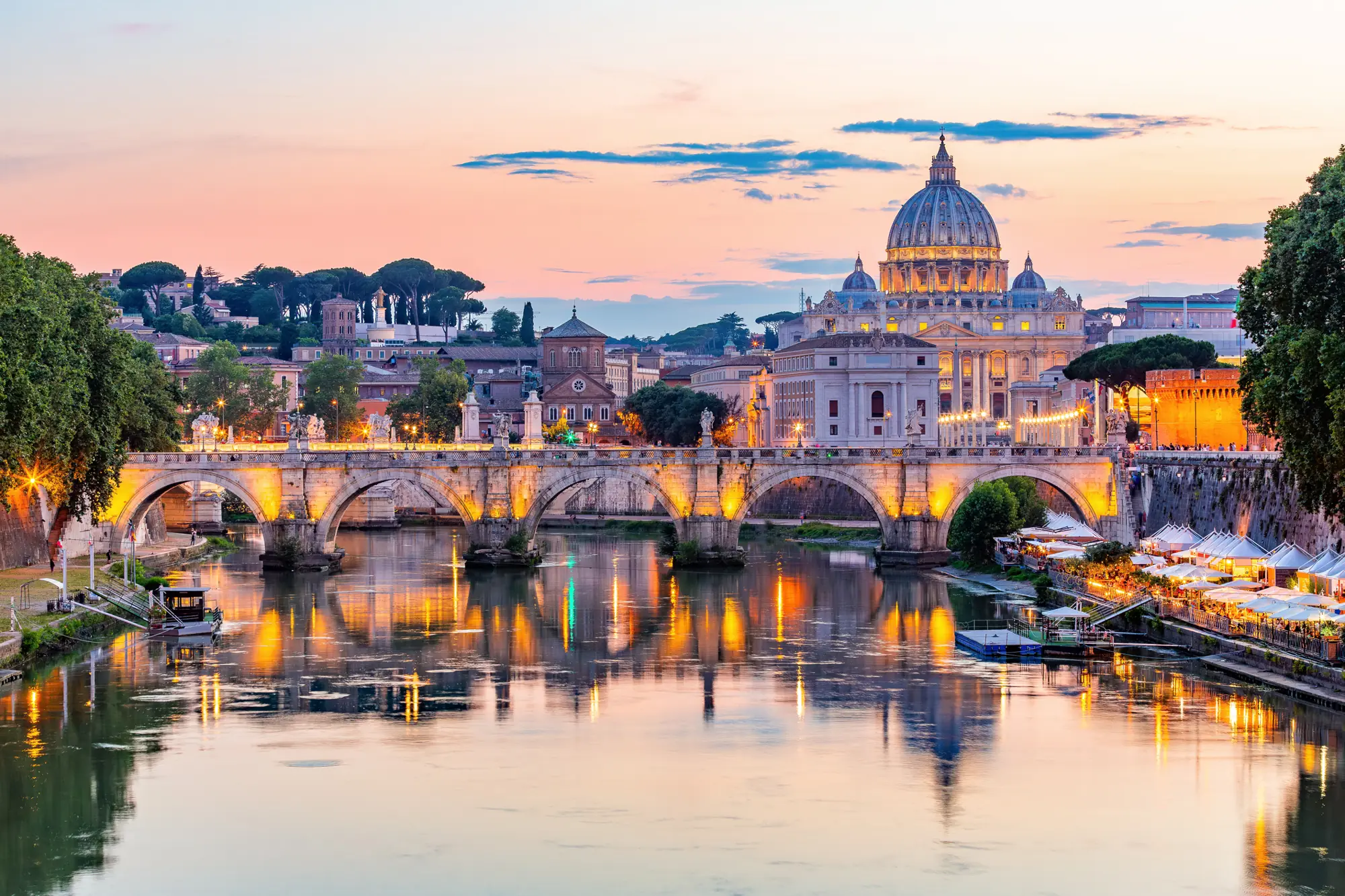 St Peter's Basilica and the Tiber in Rome at dusk