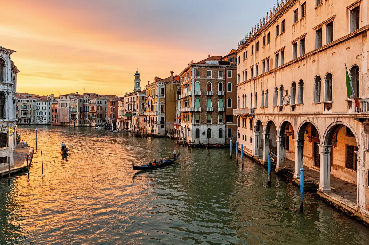 Gondolas on the Grand Canal in Venice at sunset